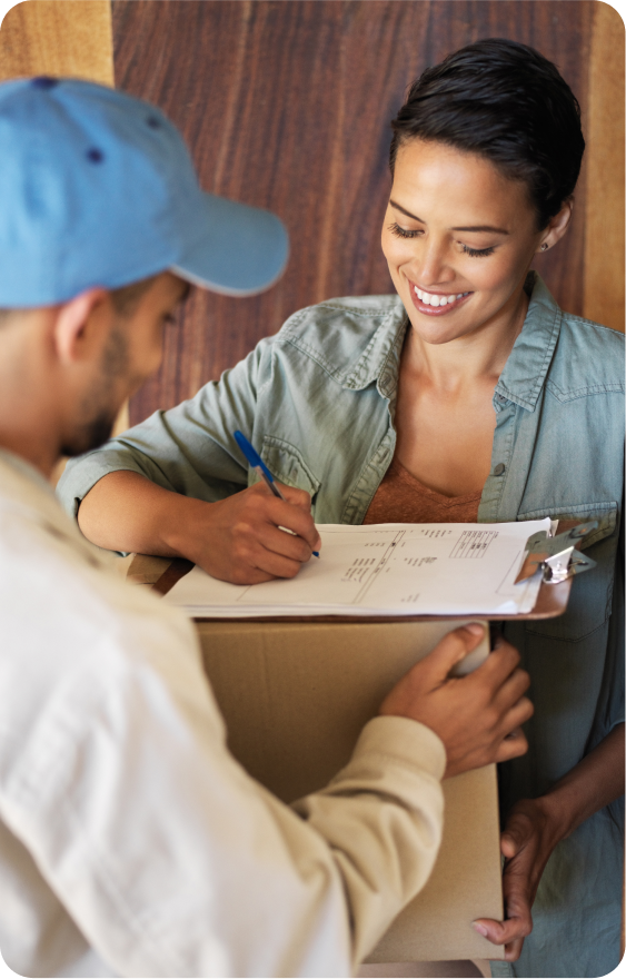 Member signing for a delivery from a Vantara Health partner pharmacy.